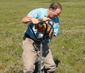 Photo of Thomas A. Douglas, co-principal investigator on the project, drilling in tundra.