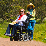 Visitor using a wheelchair on the Tennessee Valley Trail.