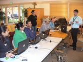 IMG: Residents from a housing community in San Jose, Calif. attend a computer ba