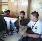 A MOUSE Squad instructor provides training support to his classmate’s family at 