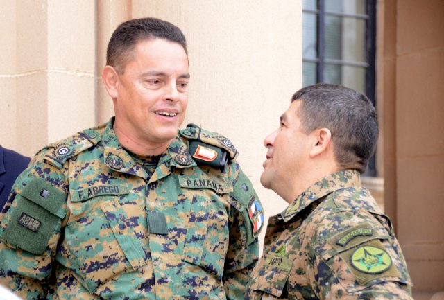 Commissioner Frank Abrego, the director general of the Panamanian Servicio Nacional de Fronteras (SENAFRONT), speaks with Salvadoran Brig. Gen. Rafael Melara, the chief of staff for the Salvadoran army, upon their arrival at the Army South headquarters on Fort Sam Houston, Texas, for the first day of the 2013 Central American Regional Leaders' Conference, Jan. 29, 2013.