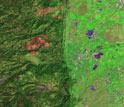 Map showing Boulder Creek, and tributary Fourmile Creek, with red burn scar from a wildfire.