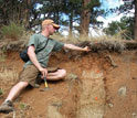 Scientist Ken Nelson collecting soils beneath trees at the Boulder Creek CZO.