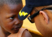 CDR Denis is preparing this little boy for the vaccinations he is about to administer