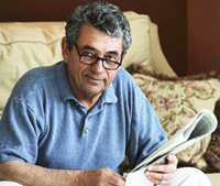 Photo of older man reading