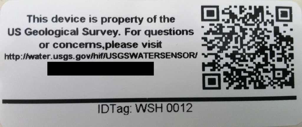 An example of a label placed on all USGS storm surge sensors