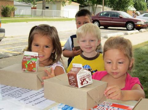 Children in Cook County, Illinois, enjoy a nutritious summer meal from the Greater Chicago Food Depository’s Lunch Bus.