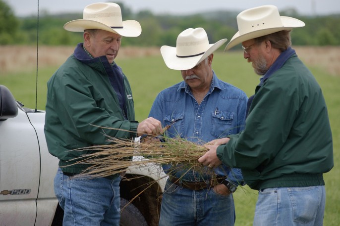 Range Management Specialists discuss ranch goals with a customer