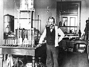 Chief Chemist Walter L. Howell analyzing sugar at the New Orleans laboratory, 1906. The flasks on the left contained sugar in solution, while the ones on the right incorporated a small amount of lead acetate to determine impurities.