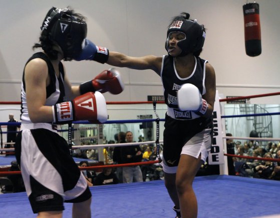It was her first fight ever, but Class of 2014 Cadet Jocelyn Lewis represented the U.S. Military Academy at West Point, N.Y., well against her opponent from the University of San Francisco at the 2013 West Point Women's Boxing Invitational inside the North End Boxing Room at the Arvin Cadet Physical Development Center, Feb. 9, 2013. Originally slated to be a two-day event, a massive winter snowstorm created a unique situation for the competitive club's cadets and coaches who had to revise their program at the last minute to include all the boxers who were able to attend. The inaugural event featured 12 bouts, with more than a few West Point cadets fighting at home for the first time.