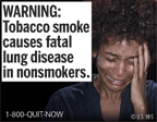 Text: WARNING: Tobacco smoke causes fatal lung disease in nonsmokers. Image: Woman very upset, crying and holding hand to side of her face. Cessation Resource: 1-800-QUIT-NOW Copyright: U.S. HHS