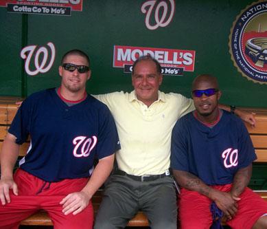 Brian Marquis and pitcher Garrett Mock (L) and center fielder Willie Harris (R)