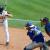 Baseball player is batting up and the catcher is ready