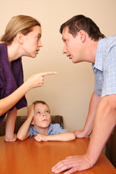 A boy watches as his parent’s argue.