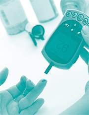 image of checking blood glucose with a meter