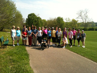 A group of women in Knoxville, TN pose before beginning their outdoor walk.