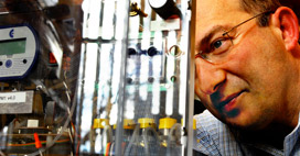 Dr. Mehmet Toner working with new microchip technology developed in his laboratory