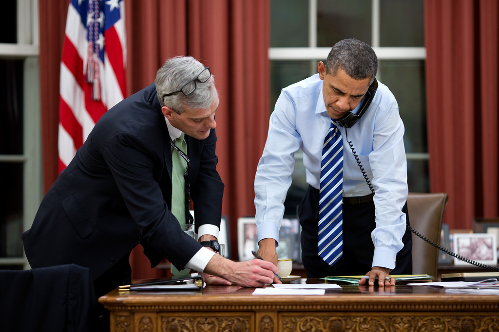 <p>President Barack Obama confers with Chief of Staff Denis McDonough as he talks on the phone in the Oval Office, Feb. 6, 2013. (Official White House Photo by Pete Souza)<br />
<br />
This official White House photograph is being made available only for publication by news organizations and/or for personal use printing by the subject(s) of the photograph. The photograph may not be manipulated in any way and may not be used in commercial or political materials, advertisements, emails, products, promotions that in any way suggests approval or endorsement of the President, the First Family, or the White House.</p>