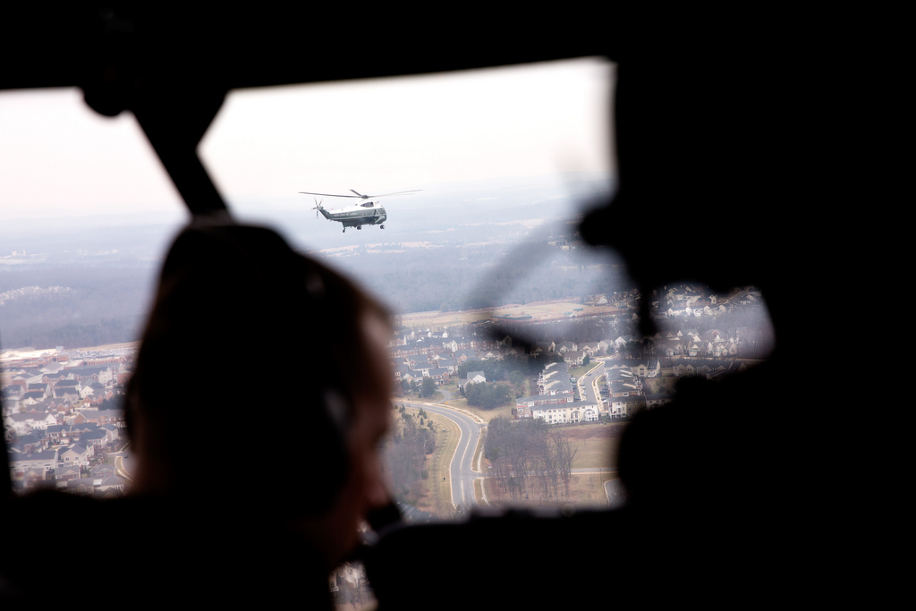 <p>Marine One is seen in flight from Nighthawk Two, as President Barack Obama travels from the White House to Leesburg, Va., Feb. 7, 2013. (Official White House Photo by Pete Souza)<br />
<br />
This official White House photograph is being made available only for publication by news organizations and/or for personal use printing by the subject(s) of the photograph. The photograph may not be manipulated in any way and may not be used in commercial or political materials, advertisements, emails, products, promotions that in any way suggests approval or endorsement of the President, the First Family, or the White House.</p>
