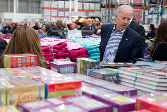 Vice President Joe Biden picks out children's books at the newly opened Costco store