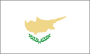 Flag of Cyprus is white with a copper-colored silhouette of the island above two green crossed olive branches in the center of the flag. 2003.