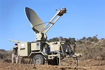 Sergeant Christopher Phillips, a satellite communications operator with Communications Company, Combat Logistics Regiment 17, 1st Marine Logistics Group, operates a satellite terminal during a CLR-17 combat operations exercise aboard Camp Pendleton, Calif., Sept. 16, 2013. Approximately 100 Marines with Communications Co. worked on setting up data, radio and wire communications systems at three sites to enable CLR-17's logistical elements to function and support other forward units with the 1st MLG. 