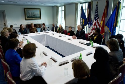 Defense Secretary Chuck Hagel talks with members of the Defense Advisory Committee on Women in the Services during a meeting at the Pentagon, Sept. 27, 2013.