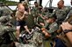 U.S. Navy Petty Officer 1st Class Cory Allen trains Philippine marines on diesel engines during an exercise on Philippine Marine Base Ternate in Ternate, Philippines, Sept. 18, 2013. The exercise demonstrates the commitment between the United States and the Philippines to strengthen their partnership, while ensuring the readiness of a bilateral force to rapidly respond to regional humanitarian crises. The U.S. sailors are assigned to Assault C, 1 Maritime Raid Force. U.S. Navy photo by Petty Officer 2nd Class Gary Granger Jr.