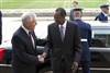 Secretary Hagel greets Burkina Faso President Blaise Compaore at the Pentagon