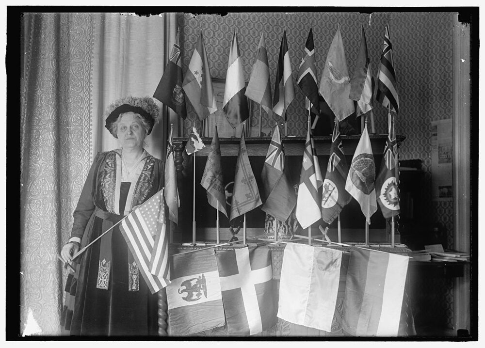 Catt with flags of 22 nations   (Library of Congress)