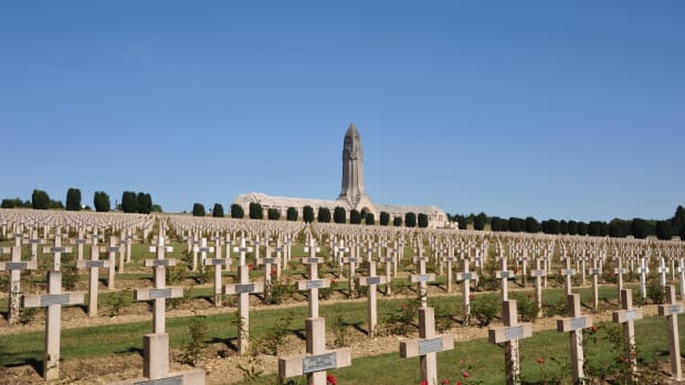 01 Aug 2009, Verdun, Lorraine, FRANCE:FRA — View over the cemetery at memorial site Douaumont, France, in August 2009. Douaumont was one of severly fought over forts in the Battle of Verdun during World War I, yet the former village is better known for the memorial and the Douaumont ossuary which contains the mortal remains of more than 130,000 unknown soldiers. The cemetery bears the remains of 15,000 French soldiers and officers KIA.   — Image by © C3420 Romain Fellens/dpa/Corbis
