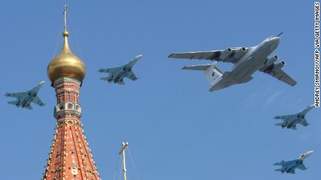 A Russian Il-80 plane and MiG-29 fighter jets fly over St. Basil&#39;s cathedral during the Victory Day parade in Moscow on May 9, 2010. t.    AFP PHOTO / ANDREY SMIRNOV (Photo credit should read ANDREY SMIRNOV/AFP via Getty Images)