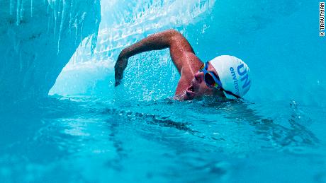 Endurance swimmer and UN Patron of the Oceans swims down a glacial river underneath the Antarctic ice sheet, in East Antarctica on 22 January 2020.