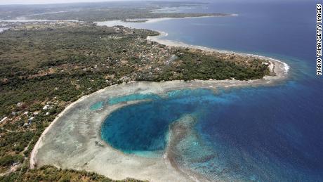 PORT VILA, VANUATU - DECEMBER 07: An aerial view of the coastline on December 07, 2019 in Port Vila, Vanuatu. Satellite data show sea level has risen about 6mm per year around Vanuatu since 1993, a rate nearly twice the global average, while temperatures have been increasing since 1950. 25 percent of Vanuatu&#39;s 276,000 citizens lost their homes in 2015 when Cyclone Pam, a category 5 storm, devastated the South Pacific archipelago of 83 islands while wiping out two-thirds of its GDP. Scientists have forecast that the strength of South Pacific cyclones will increase because of global warming. Vanuatu&#39;s government is considering suing the world&#39;s major pollution emitters in a radical effort to confront global warming challenges and curb global emissions, to which it is a very small contributor. Last year, the country banned single use plastic bags, styrofoam food containers and drinking straws in an effort to contain pollution and set an example to larger nations. (Photo by Mario Tama/Getty Images)