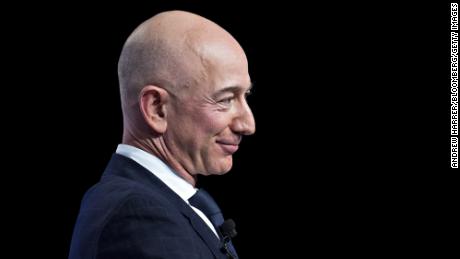 Jeff Bezos, founder and chief executive officer of Amazon.com Inc., listens during a discussion at the Air Force Association&#39;s Air, Space and Cyber Conference in National Harbor, Maryland, U.S., on Wednesday, Sept. 19, 2018. Amazon is considering a plan to open as many as 3,000 new AmazonGo cashierless stores in the next few years, according to people familiar with matter, an aggressive and costly expansion that would threaten convenience chains. Photographer: Andrew Harrer/Bloomberg via Getty Images