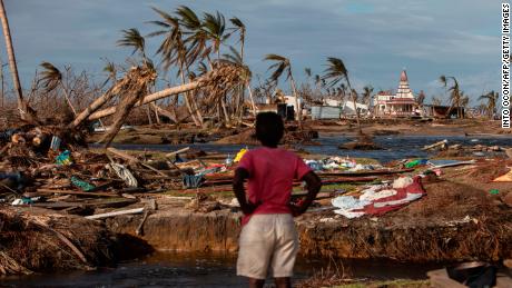 TOPSHOT - A woman looks at the destruction in Haulover, a community 41 km south of Bilwi, in the Northern Caribbean Autonomous Region, Nicaragua, on November 28, 2020, days after the passage of Hurricane Iota. - Hurricanes Eta and Iota, which hit Nicaragua on November 3 and 16 respectively, left at least 200 confirmed dead and as many missing as they smashed homes, uprooted trees and swamped roads during their destructive advance across several Central American countries. (Photo by Inti OCON / AFP) (Photo by INTI OCON/AFP via Getty Images)