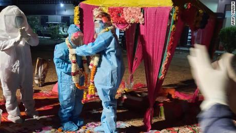 The bride and groom exchange garlands in Baran, Rajasthan, India.