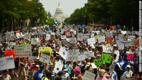 WASHINGTON, DC - APRIL 29:  People march from the U.S. Capitol to the White House for the People&#39;s Climate Movement to protest President Donald Trump&#39;s enviromental policies April 29, 2017 in Washington, DC. Demonstrators across the country are gathering to demand  a clean energy economy. (Photo by Astrid Riecken/Getty Images)