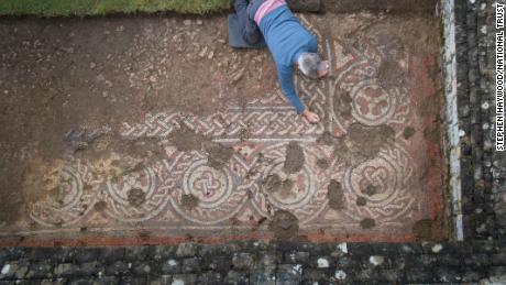 National Trust archaeologists have discovered the first 5th century mosaic to ever have been discovered in Britain -- a find they say is of historical importance.