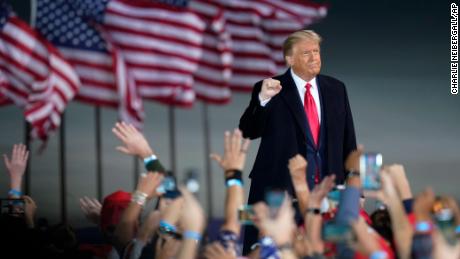 President Donald Trump arrives at a campaign rally at Des Moines International Airport, Wednesday, Oct. 14, 2020, in Des Moines, Iowa. (AP Photo/Charlie Neibergall)