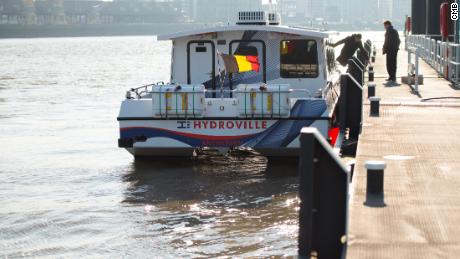 The Hydroville berthed at the Scheldt River, ready to embark passengers.