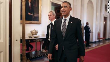 WASHINGTON, DC - FEBRUARY 02: U.S. President Barack Obama (R) and National Hockey League champions Los Angeles Kings Head Coach Darryl Sutter walk into the East Room of the White House February 2, 2015 in Washington, DC. Obama simultaneously hosted the Kings and the Major League Soccer champions Los Angeles Galaxy. Both teams are owned in part by billionaire and The Weekly Standard publisher Philip Anschutz. (Photo by Chip Somodevilla/Getty Images)