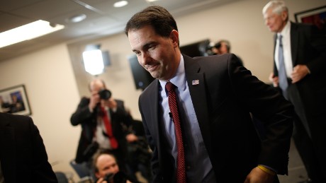 WASHINGTON, DC - JANUARY 30: Wisconsin Governor Scott Walker departs after speaking at the American Action Forum January 30, 2015 in Washington, DC. Earlier in the week Walker announced the formation of &#39;Our American Revival&#39;, a new committee designed to explore the option of a presidential bid in 2016. (Photo by Win McNamee/Getty Images)