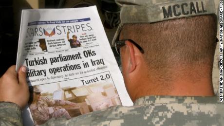 U.S. Army Sgt. Roger McCall, 153rd Military Police Company, reads an edition of the Stars and Stripes newspaper while in the Green Zone, Baghdad, Oct. 18, 2007. The 153rd MP Company is a unit of the Delaware Army National Guard currently assigned to the 89th MP Brigade. (U.S. Army National Guard photo by Sgt. Brendan Mackie/Released)