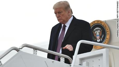 US President Donald Trump steps off Air Force One upon arrival at Andrews Air Force Base in Maryland on October 1, 2020. - The president returned to Washington, DC after attending a fundraiser in Bedminster, New Jersey. (Photo by MANDEL NGAN / AFP) (Photo by MANDEL NGAN/AFP via Getty Images)