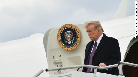 US President Donald Trump steps off Air Force One upon arrival at Morristown Municipal Airport in Morristown, New Jersey en route to Bedminster, New Jersey on October 1, 2020, for a fundraiser. (Photo by Mandel Ngan/AFP/Getty Images)