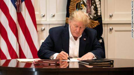 President Donald J. Trump works in the Presidential Suite at Walter Reed National Military Medical Center in Bethesda, Md. Saturday, Oct. 3, 2020, after testing positive for COVID-19.