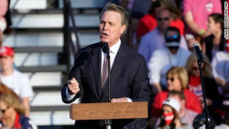 Sen. David Perdue, R-Ga., speaks during a campaign rally for President Donald Trump at Middle Georgia Regional Airport, Friday, Oct. 16, 2020, in Macon, Ga. (AP Photo/John Bazemore)