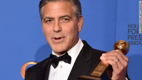 Caption:BEVERLY HILLS, CA - JANUARY 11: Actor/director George Clooney, recipient of the Cecil B. DeMille Award, poses in the press room during the 72nd Annual Golden Globe Awards at The Beverly Hilton Hotel on January 11, 2015 in Beverly Hills, California. (Photo by Kevin Winter/Getty Images)
