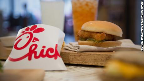 French fries and a fried chicken sandwich are arranged for a photograph during an event ahead of the grand opening for a Chick-fil-A restaurant in New York, U.S., on Friday, Oct. 2, 2015. Chick-fil-A, the Southern chicken-sandwich chain that has drawn both controversy and copycats over the years, has finally arrived in New York. The company will open a 5,000-square-foot (465-square-meter), three-level restaurant in Manhattan&#39;s Garment District that will be the chain&#39;s largest location in the nation. Photographer: Michael Nagle/Bloomberg via Getty Images